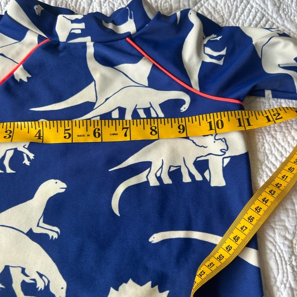Mini Boden boys rashguard. Royal blue background with ivory dinosaurs .Size 2/3 - Picture 6 of 7